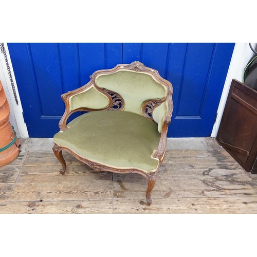 459 - A French design Wide Seated Carved Pierced Back Fauteuil Chair upholstered in Green Velour.