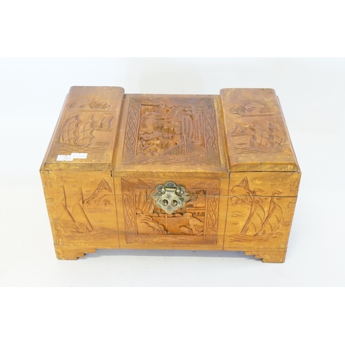 519 - A Carved Chinese Jewellery Box designed as a miniature Coffer.