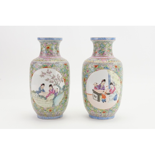 513 - A Pair of Chinese Jin Qua decorated Traditional Bolster Vases decorated with scenes of children & ev... 