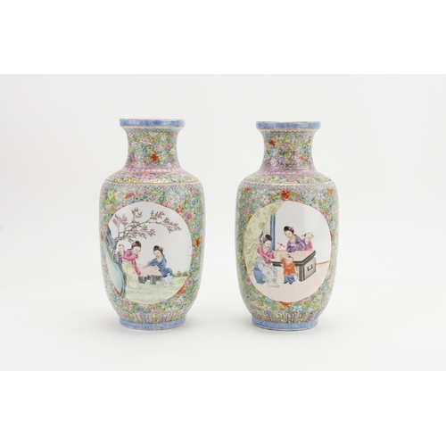 513 - A Pair of Chinese Jin Qua decorated Traditional Bolster Vases decorated with scenes of children & ev... 