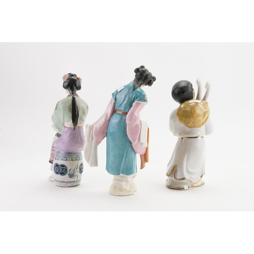 514 - Three Chinese Glazed & Coloured Bisque Figurines depicting a young boy with Geese in sack, a Long Sl... 