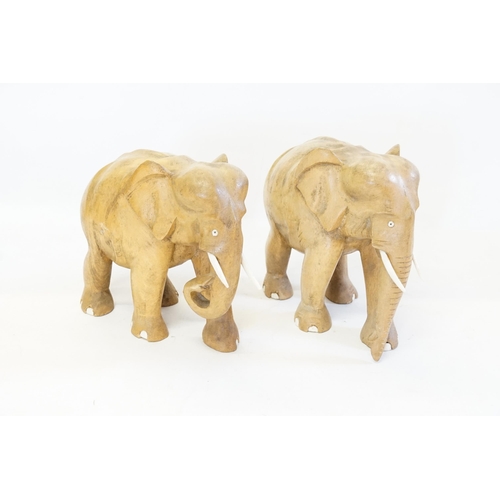 757 - A Pair of Carved Wood Elephants. Standing: 20cms.