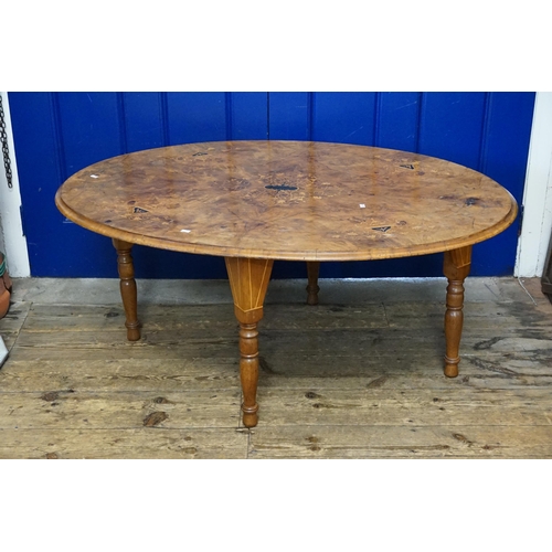 423 - A Victorian inlaid Walnut Loo Table on later base. Measuring: 117cms across x 82cms wide.