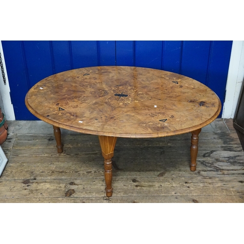 423 - A Victorian inlaid Walnut Loo Table on later base. Measuring: 117cms across x 82cms wide.