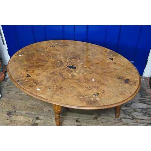 423 - A Victorian inlaid Walnut Loo Table on later base. Measuring: 117cms across x 82cms wide.