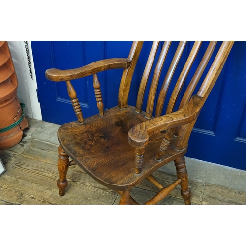 419 - An Antique Elm seated & Beech Splat Back Wide Angled Kitchen Chair with Turned Legs & Stretchers.