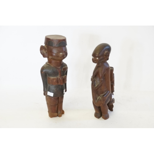 756 - A Carved African Colonial Figure of a French Officer in European attire & one other of a Breast Feed... 