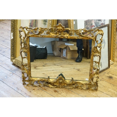 477 - A 1950s Gesso Mirror of Rococo Form. Measuring: 74cms x 59cms.