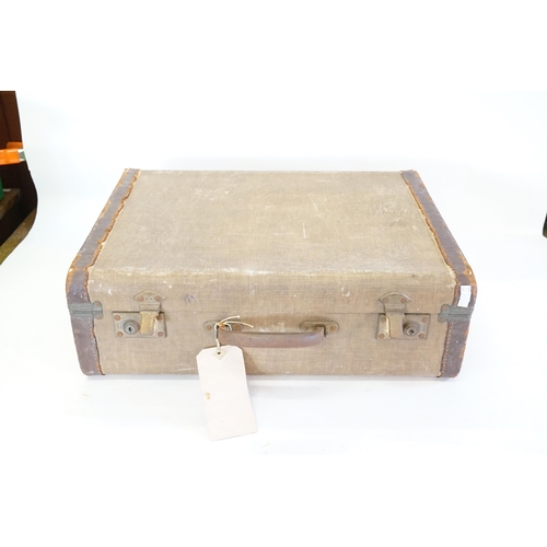 491 - A 1920s Canvas & Leather Bound Suitcase.