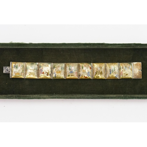 536 - A Silver & Mother of Pearl design Bracelet with painted decoration contained in a case.