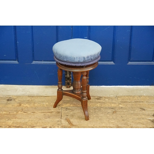 461 - A Victorian Turned Mahogany Music Stool with Blue Velvet Seat.