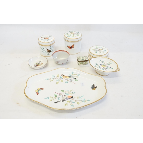 678 - The Residue of a Coalport Ladies Dressing Table Set painted with birds consisting of a Tray, three p... 