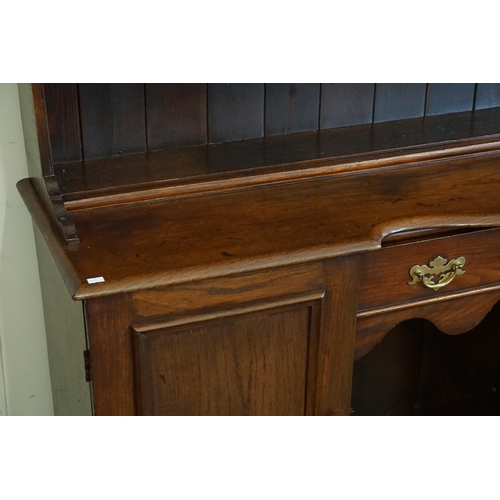 471 - An early 19th Century Mahogany Kitchen Dresser with Cupboards & Drawers. Measuring: 154cms across x ... 