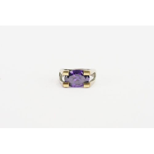 164 - A oval amethyst set ring, mounted in a silver mounted white metal. Amethyst approx 3.5ct. Weight 6g.... 