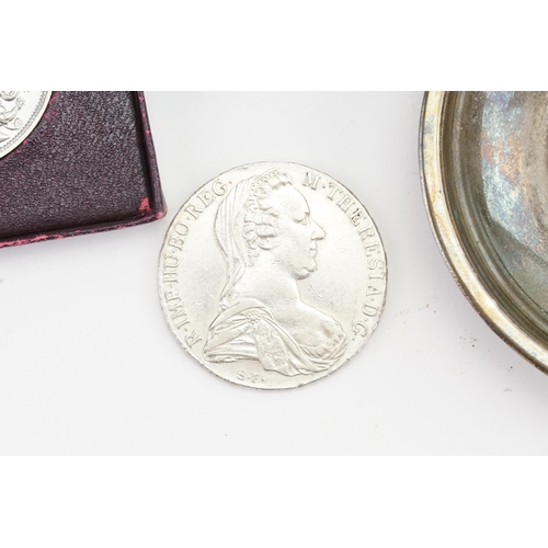 230 - A 1951 5 shilling, along with a mounted 1780 Mother Theresia.