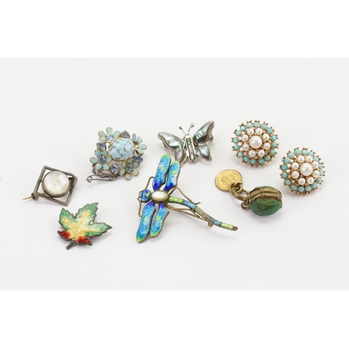 168 - A collection of costume jewellery, to include a enamelled scarab, enamelled dragonfly , enamelled ma... 