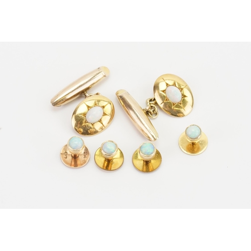 161 - A pair of Opal set cufflinks, along with four opal mounted buttons, one marked 18ct and one marked 9... 