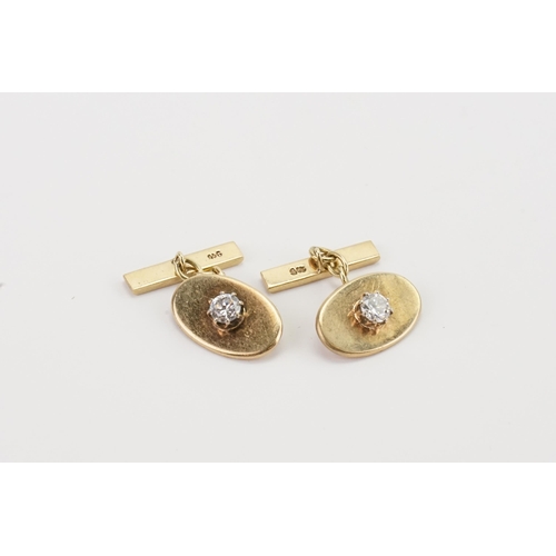 120 - A pair of 9ct gold paste set cufflinks.