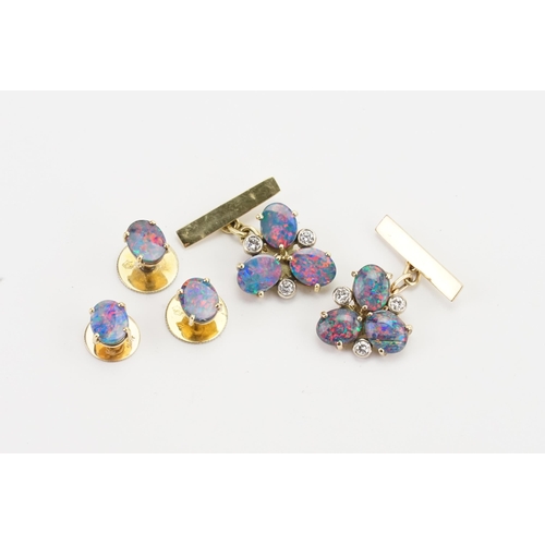 123 - A pair of Opal and diamond set cufflinks, along with three opal buttons. One marked 18ct. Weight 14g... 