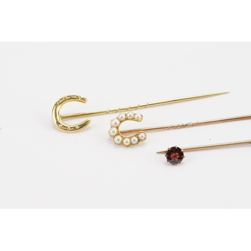 125 - A collection of gold coloured stick pins, to include pearl set etc.