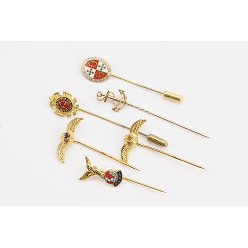 126 - A collection of gold coloured stick pins, to include Masonic, enamelled etc. Along with a 9ct gold a... 