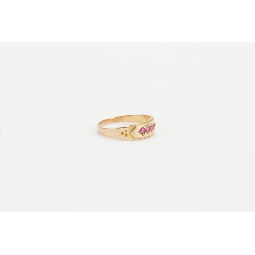 134 - A 15ct gold ruby set ring, set with five rubies. Weight 1.9g. Size M.