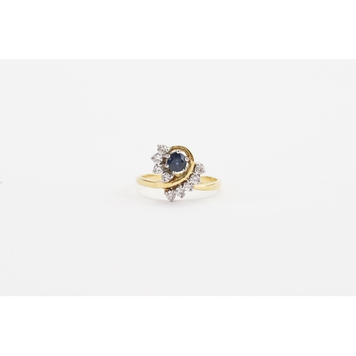 136 - TEST. A gold coloured sapphire and diamond set ring. Sapphire approx 0.3ct. Weight 4g. Size O.