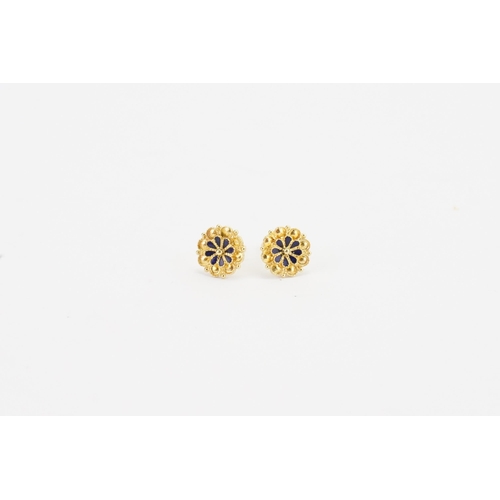 139 - A pair of gold coloured blue enamelled floral earrings. TEST.