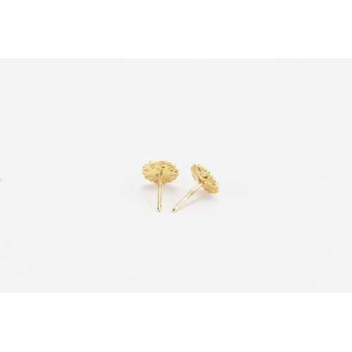 139 - A pair of gold coloured blue enamelled floral earrings. TEST.