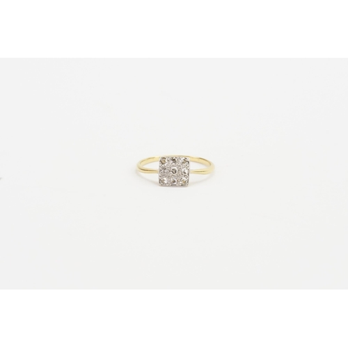 106 - A 18ct gold diamond set ring, in the square formation. Weight 1.4g. Size L.