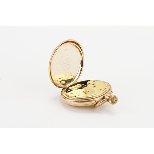 207 - A 14ct Gold plated Half Hunter Pocket Watch with a Roman numeral white dial.