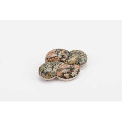 153 - A Scottish pebble brooch, set with various stone. Width 5.1cm.