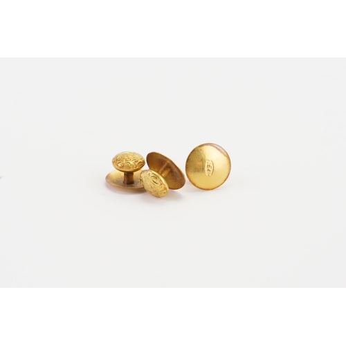 157 - Three 15ct gold dress studs. Weight 2.7g.