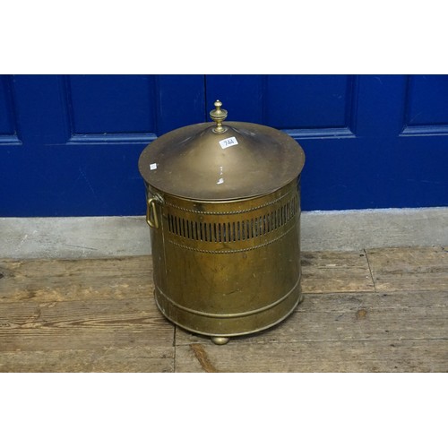 744 - A Sheet Brass Die stamped Coal Box of Adams design. Measuring: 48cms high.