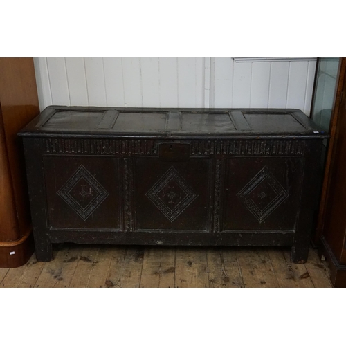 451A - An Antique Oak Three Panelled Linen Fold & Chip Carved Squares Coffer with a Four Panelled Reset Top... 