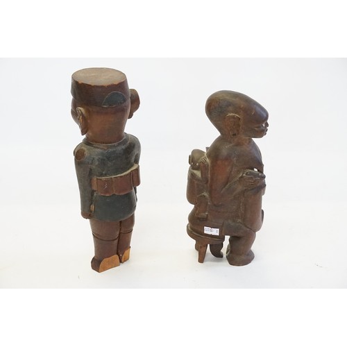 756 - A Carved African Colonial Figure of a French Officer in European attire & one other of a Breast Feed... 