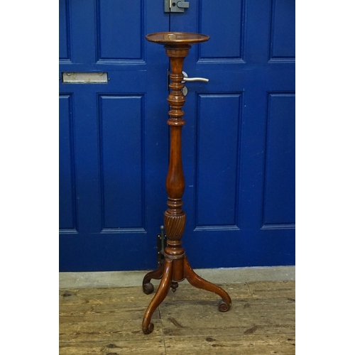 601 - A Mahogany Jardiniere Stand of turned & fluted Adams design decoration resting on a tripod base. Mea... 