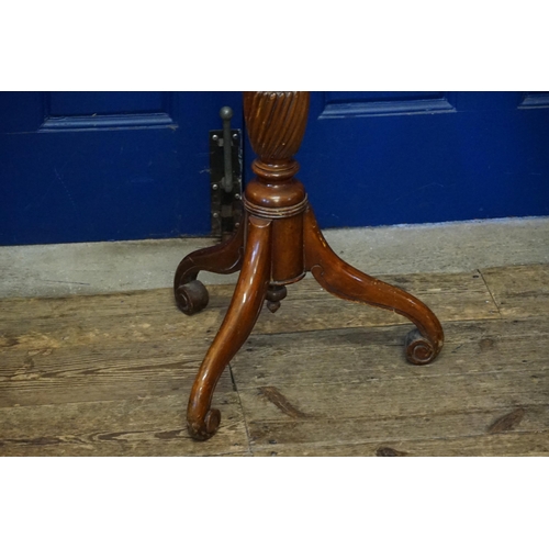 601 - A Mahogany Jardiniere Stand of turned & fluted Adams design decoration resting on a tripod base. Mea... 