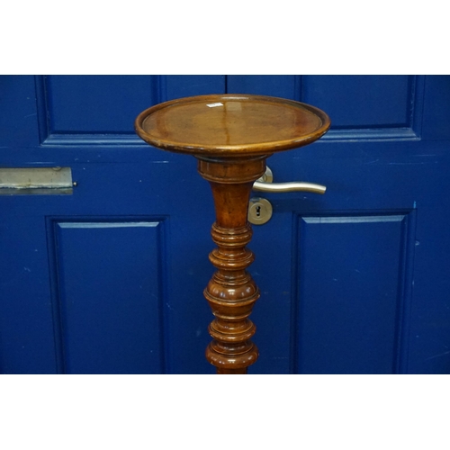 601 - A Mahogany Jardiniere Stand of turned & fluted Adams design decoration resting on a tripod base. Mea... 