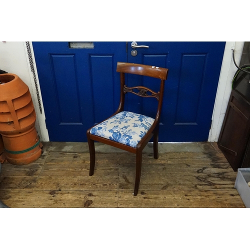 612 - A Victorian Curved Back Carved Splat Dining Chair resting on Sabre Front Legs & a Upholstered in Blu... 