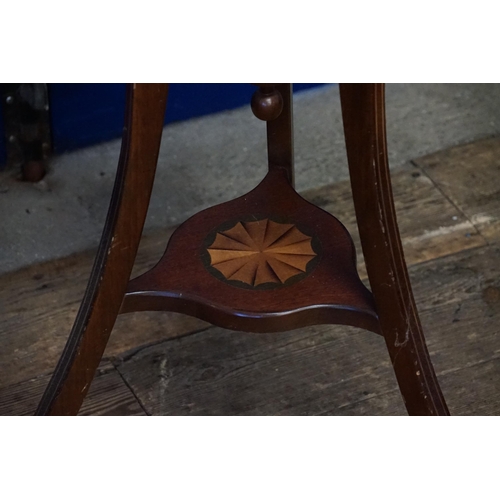 622 - A Mahogany & Shell inlaid Jardiniere Stand with Brass liner, Lion Ring Pull Handles & resting on a s... 