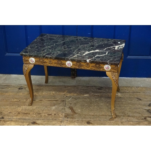 625 - A Serpentine Marble Topped Occasional Variegated Table. Measuring: 72cms x 44cms.