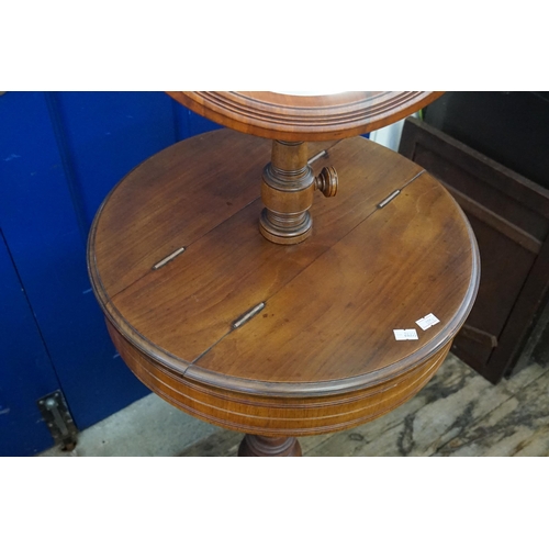 635 - A Victorian Circular Shaving Mirror with Swivelling Lift Up Containers resting on a turned wood base... 