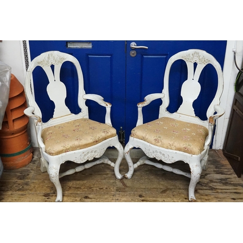 645 - A Pair of French 18th Century Oak Framed Open Armed Dining Chairs with Wide Seats with heavily Carve... 