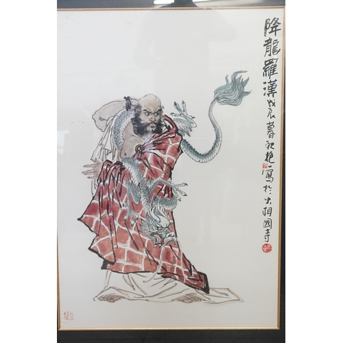 903 - A Japanese Water Colour of a God entwined with a Dragon with a Red Seal mark. Measuring: 82cms x 102... 