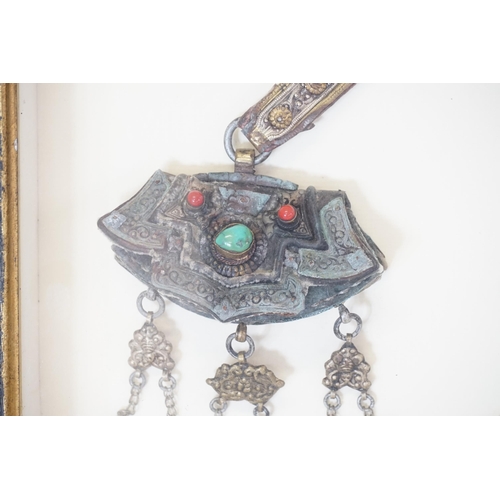 913 - An Indian Gem Set Purse Tobacco Box & a similar Tobacco Cutter, White metal mounts, Framed & Glazed.