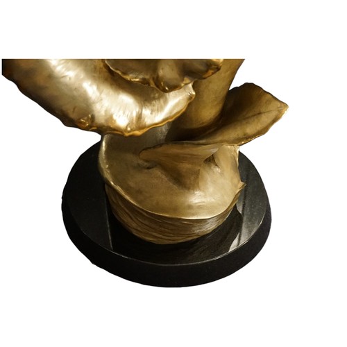 707 - A Very Large Cast Bronzed Arum Lily resting on a black marble base with protruding fronds, signed 