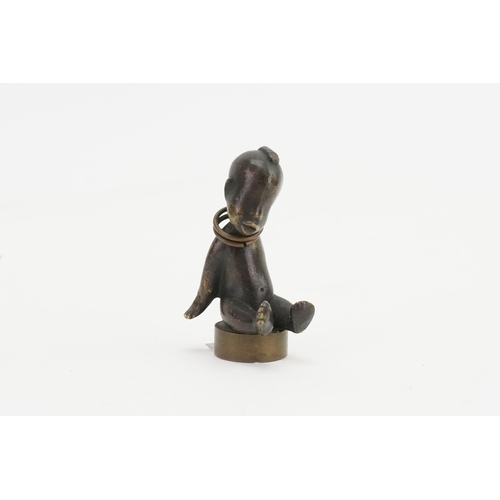 713 - A Hagenauer Bronze Study of a Desk Weight designed as a young African boy.