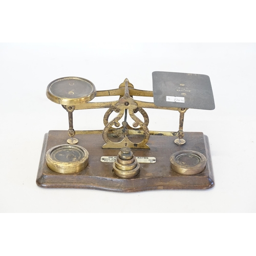 724 - A Set of Brass Post Office Scales.