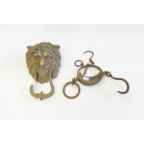 727 - A Heavy Brass Lion's Head Door Knocker & a set of Pig Scales.